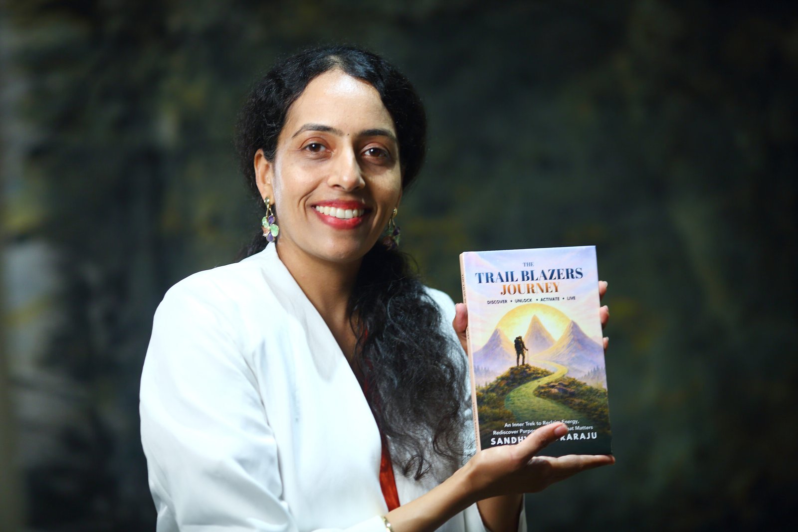 Sandhya Rudraraju with her book, The Trail Blazers Journey